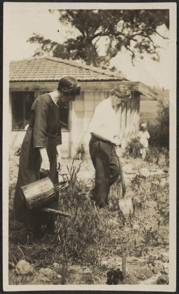 Marion Mahony Griffin and Walter Burley Griffin gardening in the bakyard of Pholiota, Heildelberg, Victoria, 1918_National Library of Australia